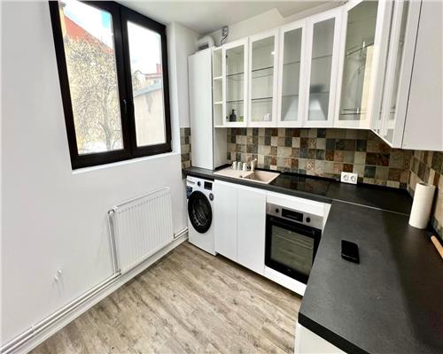 Apartament 2 camere cu pod si curte in Centrul Brasovului